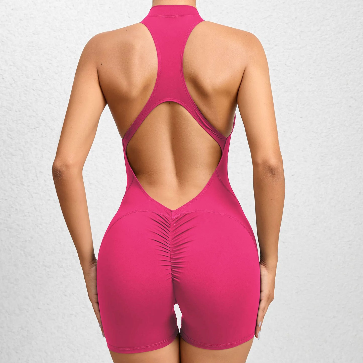 Naisten lyhyt hihaton urheilujumpsuit