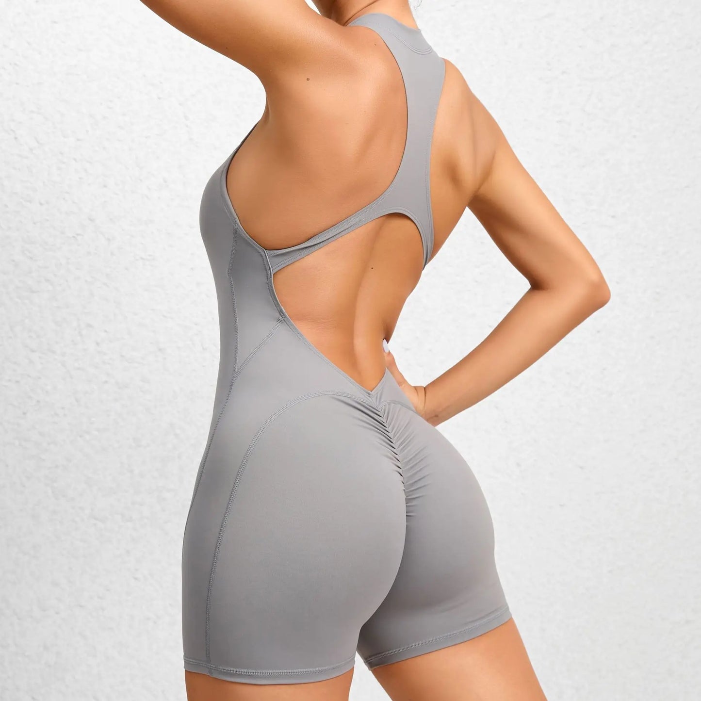 Naisten lyhyt hihaton urheilujumpsuit